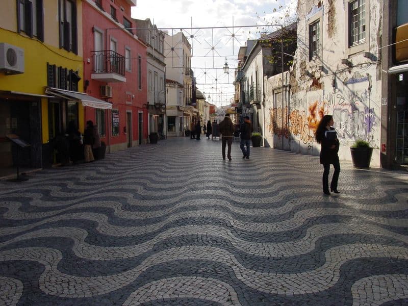   This is a flat promenade but the "waves" in the paving create a visual distortion.