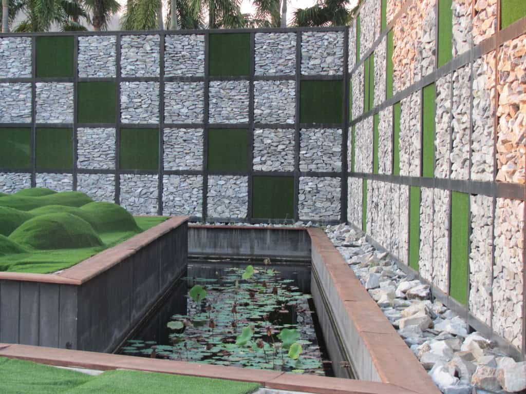 The walls are an amazing checkerboard of stacked rock and grass.