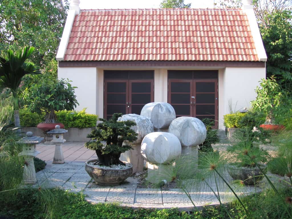 This garden is from Vietnam and I loved the patio, planted containers and the sculptural water feature. 